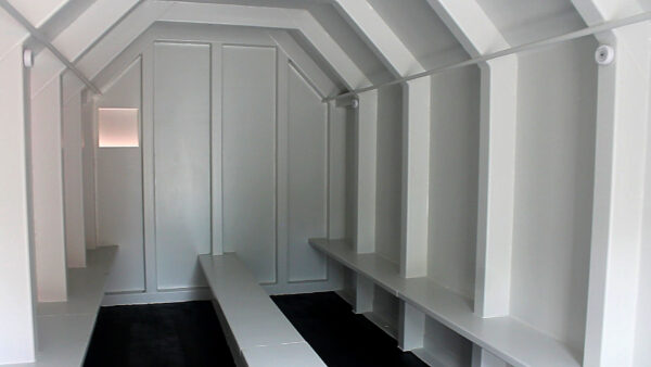 Community Tornado Storm Shelter interior with benches