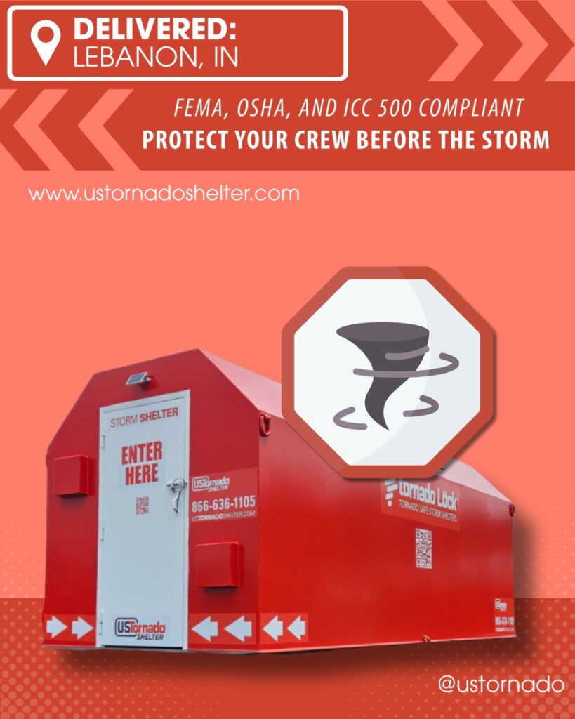 Bright red tornado storm shelter delivered to a jobsite, displaying clear entry signage, emergency contact information, and compliance with safety standards. The shelter is designed for quick access during severe weather on construction or temporary worksites.